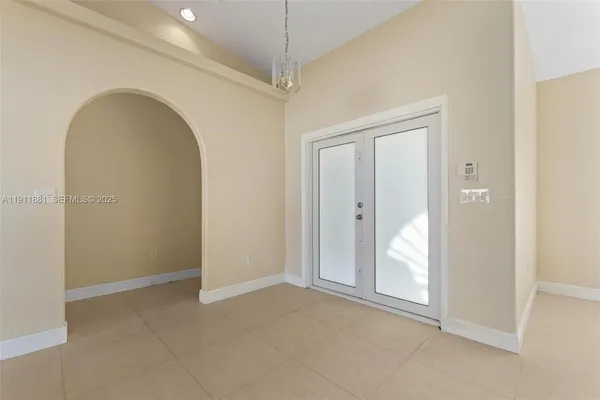 an empty room with window in it