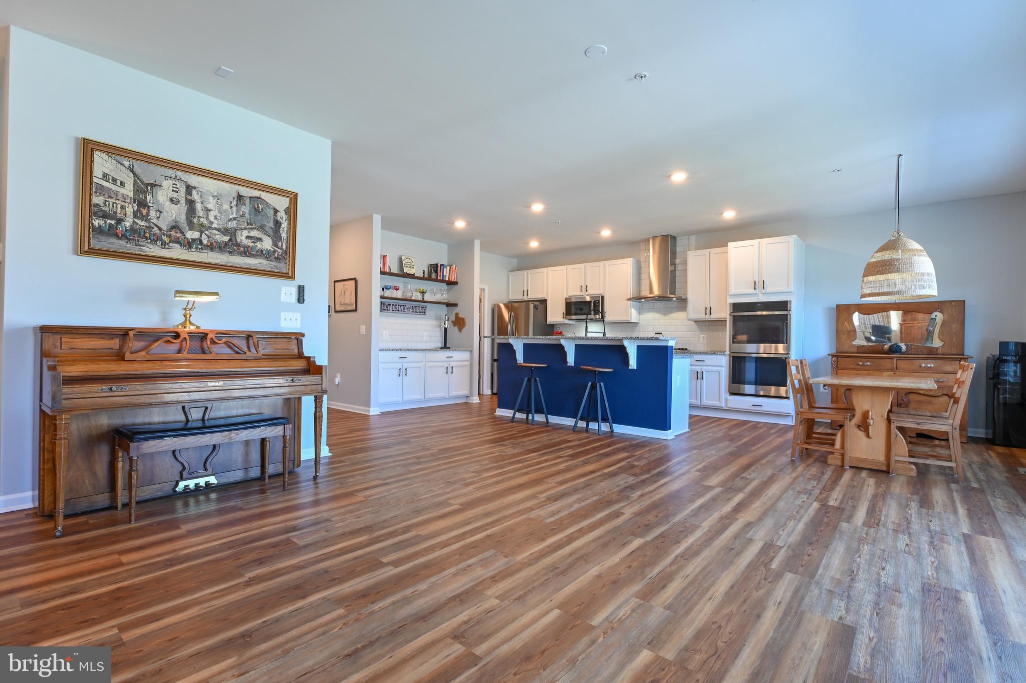 5559 Trafalgar Circle Tilghman, MD 21671 - Photo 17 of 62 a living room with furniture and a wooden floor