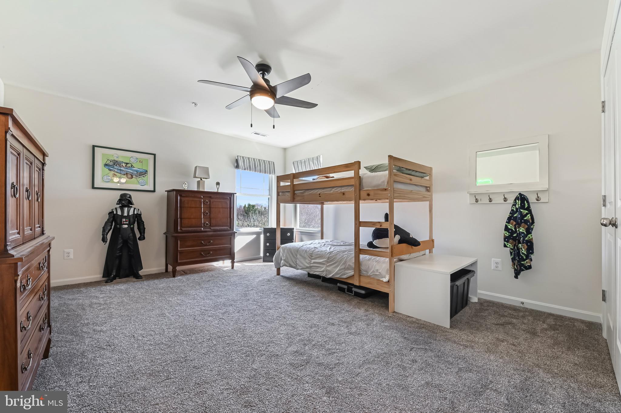 5559 Trafalgar Circle Tilghman, MD 21671 - Photo 40 of 62 a bed room with furniture and a flat screen tv