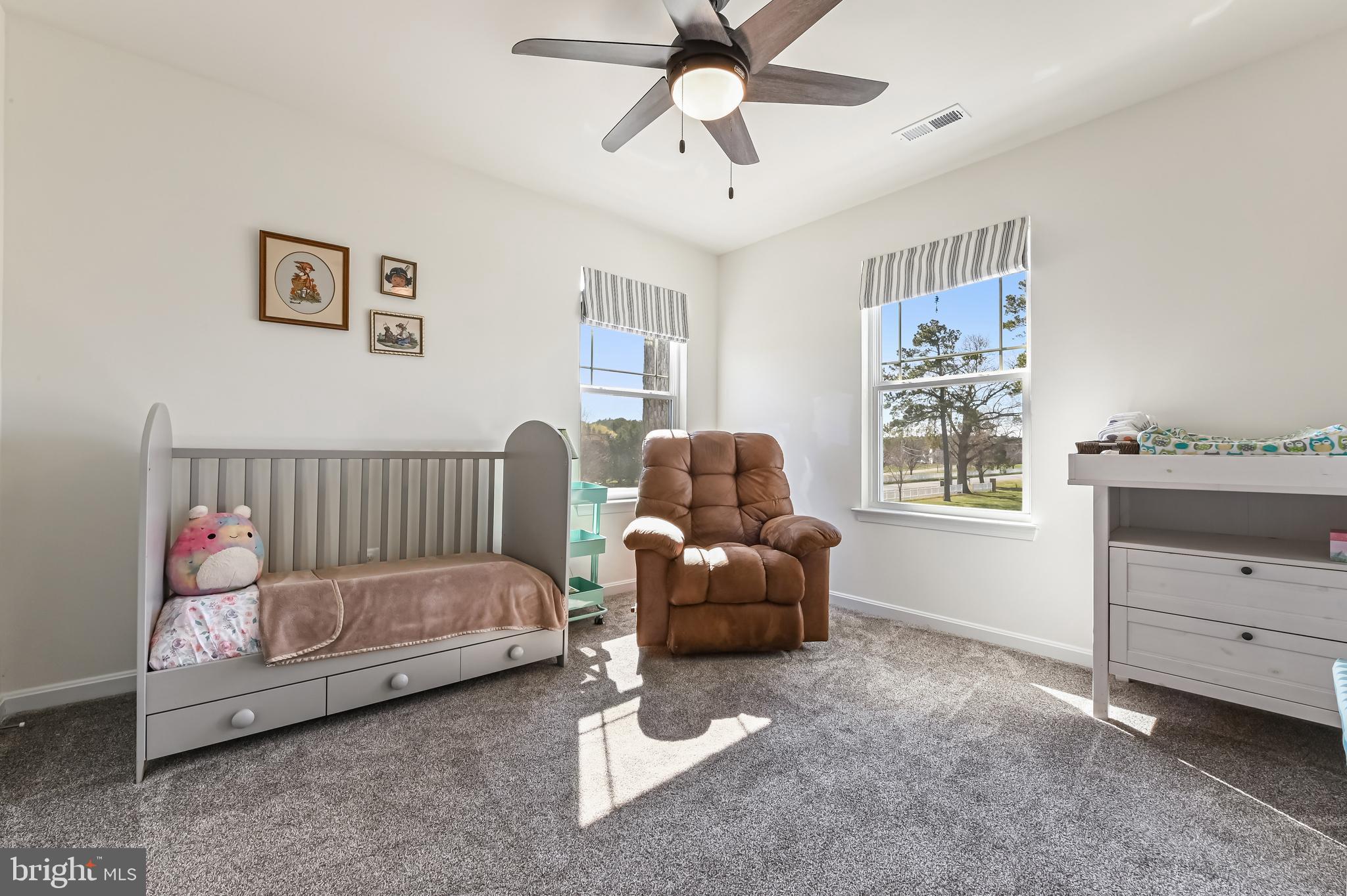 5559 Trafalgar Circle Tilghman, MD 21671 - Photo 44 of 62 a bedroom with furniture and window