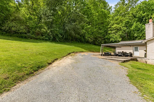 a house with garden in front of it