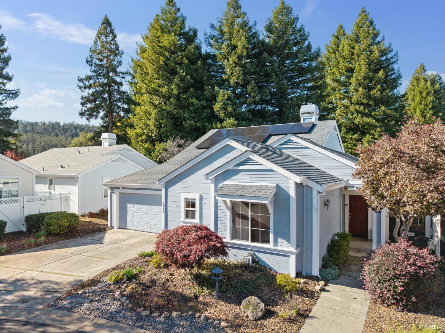 6471 Pine Valley Drive Santa Rosa, CA 95409 - Photo 2 of 48 a front view of a house with a garden and plants