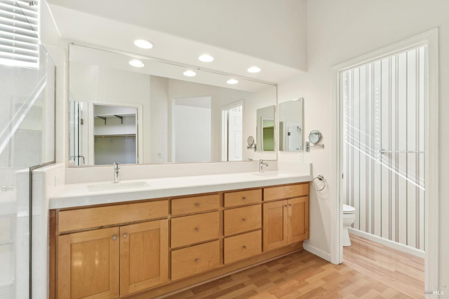 6471 Pine Valley Drive Santa Rosa, CA 95409 - Photo 29 of 48 a bathroom with a sink and a mirror