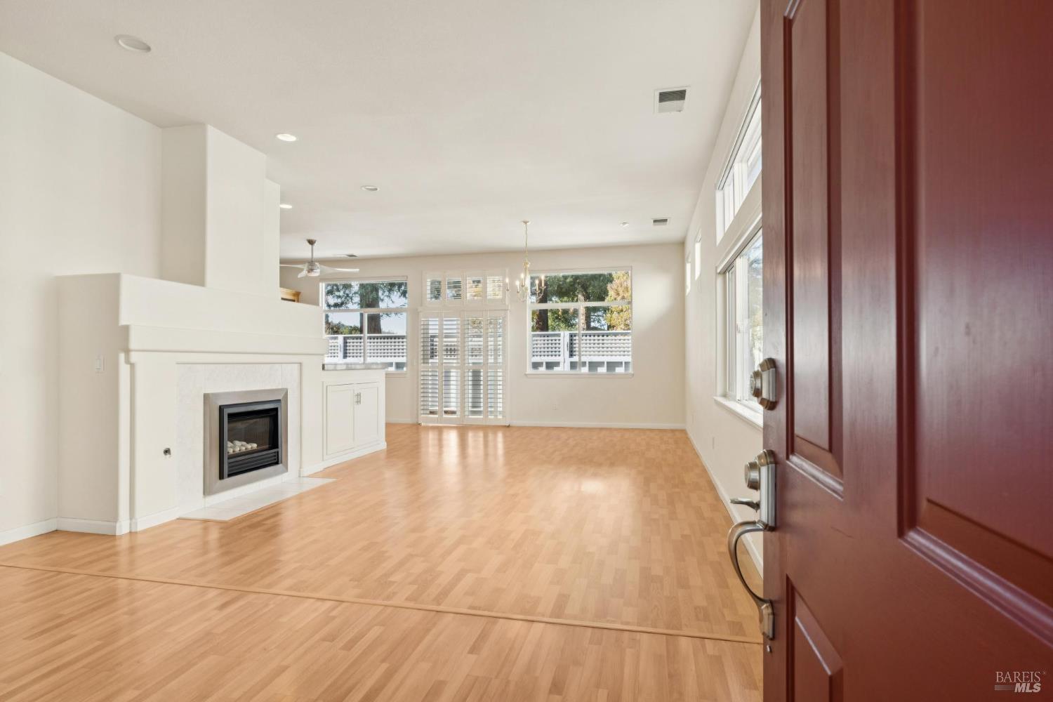 6471 Pine Valley Drive Santa Rosa, CA 95409 - Photo 4 of 48 a view of a livingroom with an empty space and a fireplace