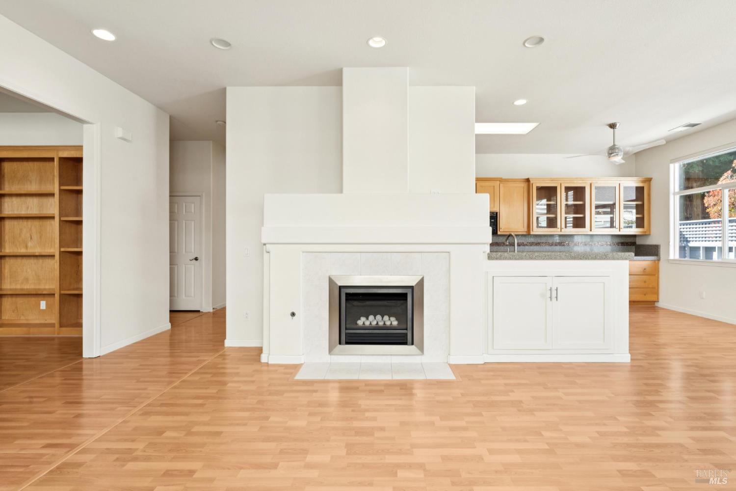 6471 Pine Valley Drive Santa Rosa, CA 95409 - Photo 5 of 48 a view of a kitchen with a sink and a fireplace