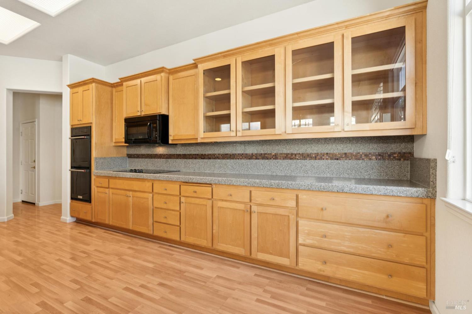 6471 Pine Valley Drive Santa Rosa, CA 95409 - Photo 8 of 48 a kitchen with stainless steel appliances granite countertop a stove and a sink