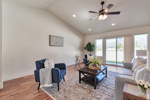 1288 North Horizon View Loop Elk Ridge, UT 84651 - Photo 7 of 40 Living room featuring light wood finished floors, a ceiling fan, lofted ceiling, and recessed lighting
