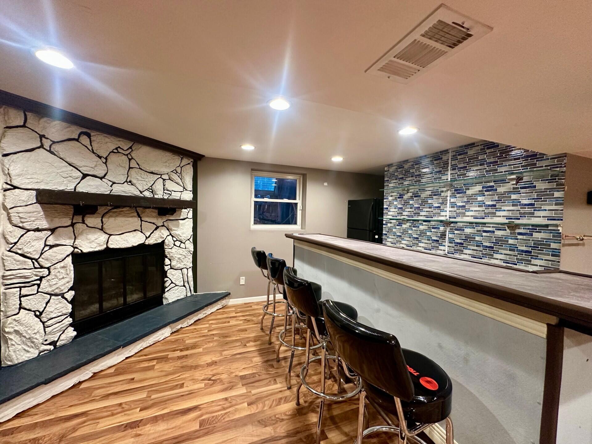 3907 Brookside Drive Crown Point, IN 46307 - Photo 2 of 22 a living room with furniture and a fireplace