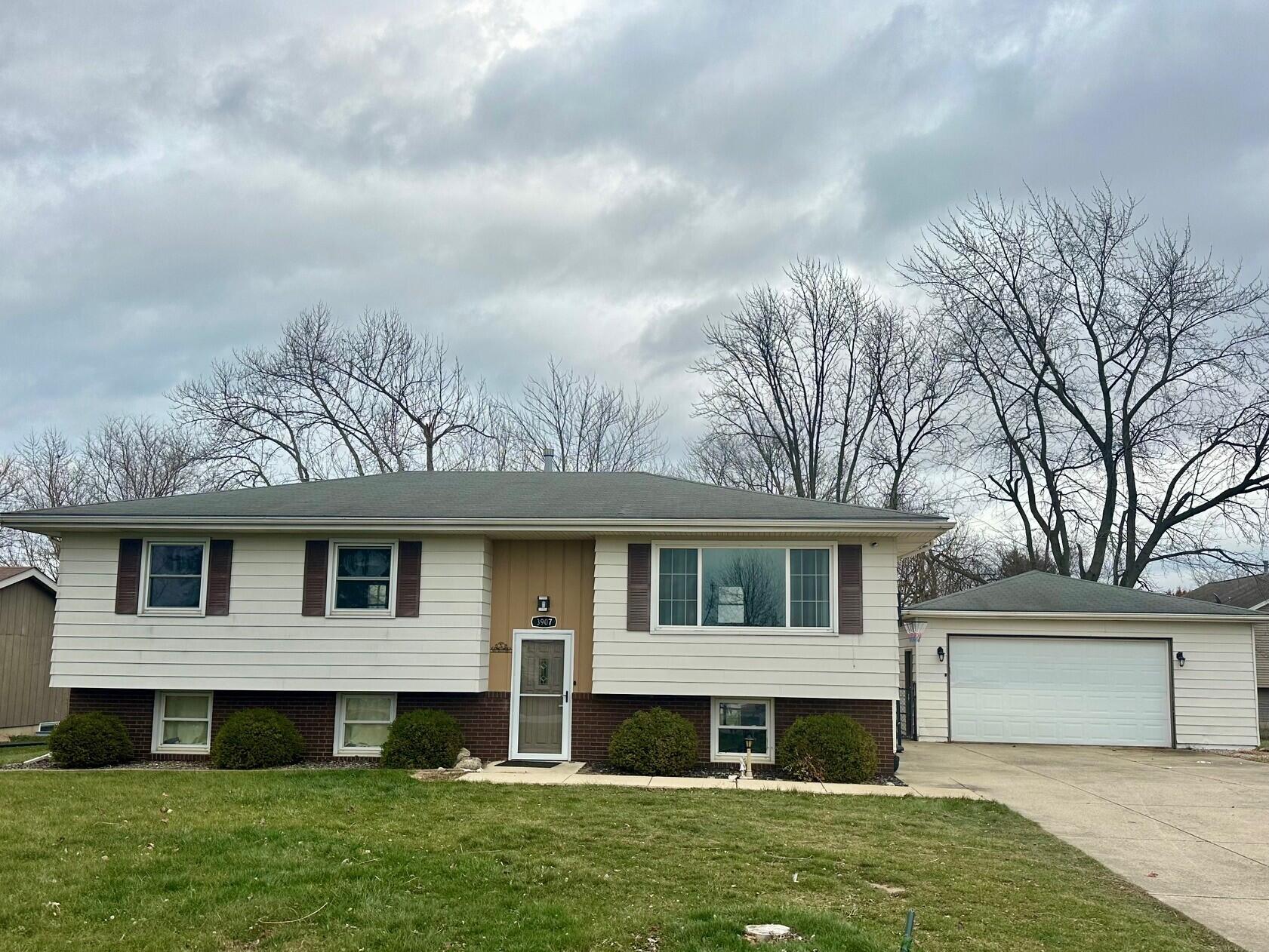 3907 Brookside Drive Crown Point, IN 46307 - Photo 22 of 22 a front view of a house with a yard