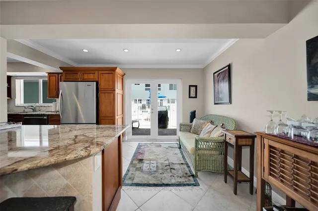 a living room with fireplace furniture and a flat screen tv
