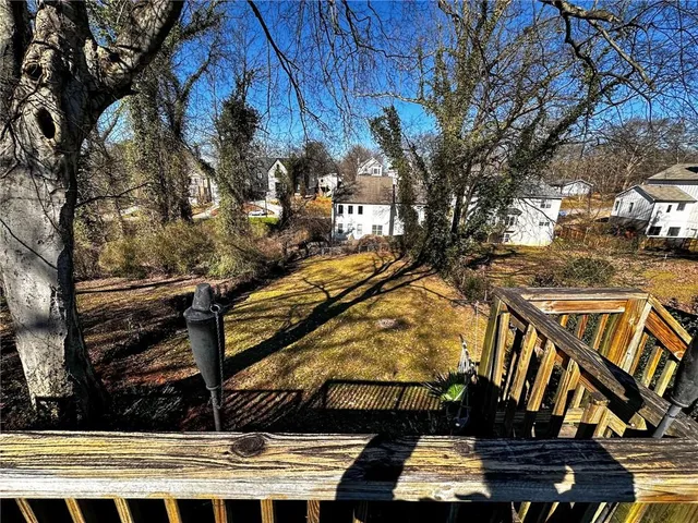 a view of street along with trees
