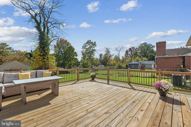 a view of balcony with deck and wooden floor