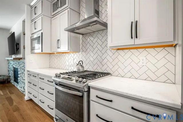 a dining room with furniture a window and kitchen view