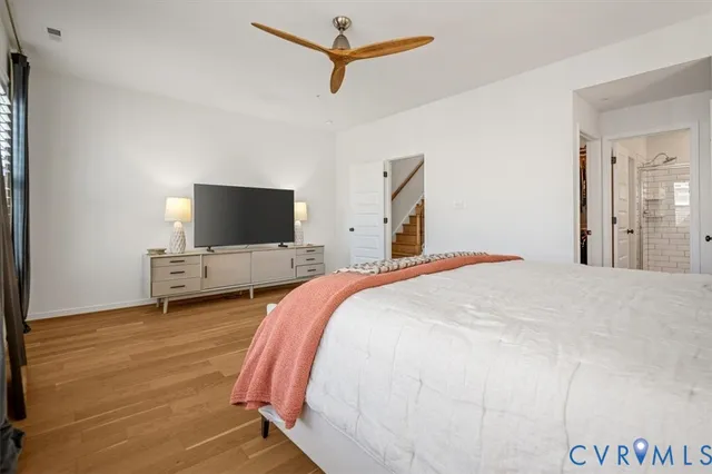 a bathroom with a sink vanity and a mirror