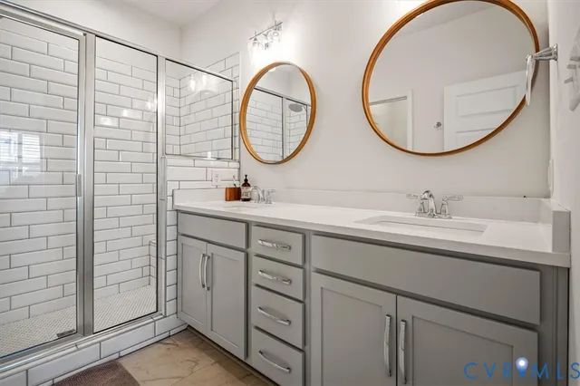 a view of a hallway with wooden floor and entryway