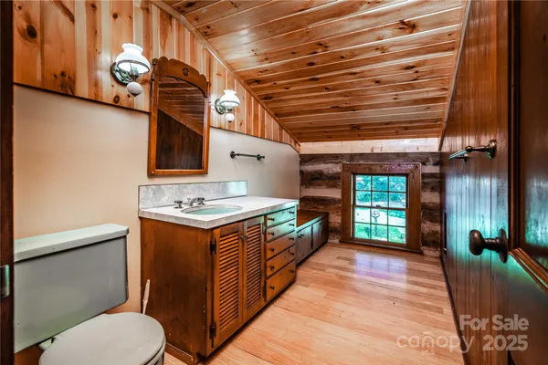 a kitchen with a stove and a refrigerator