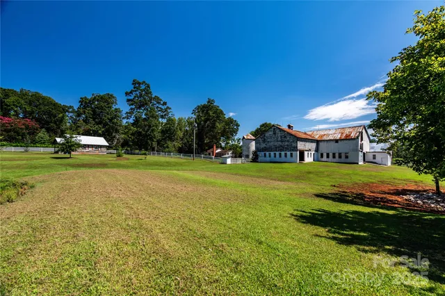 a view of a house with a big yard