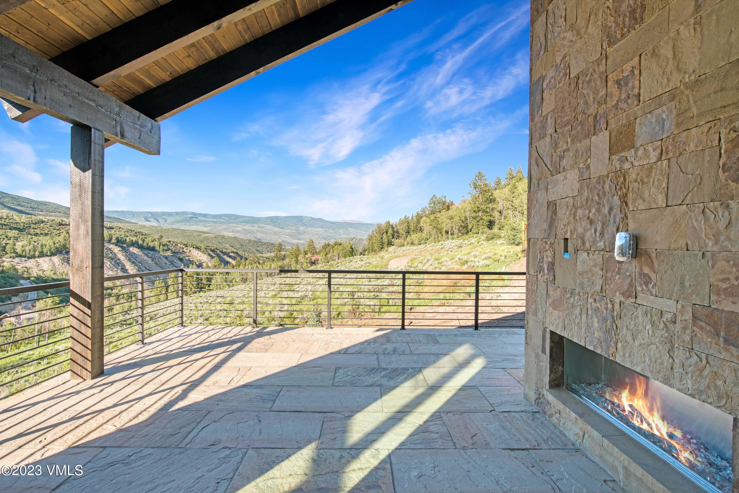 483 Graham Road Edwards, CO 81632 - Photo 22 of 23 Covered Deck with Built-in Fireplace