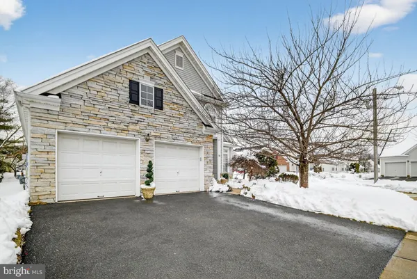 a view of garage and yard