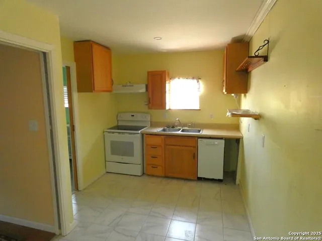 a utility room with a sink