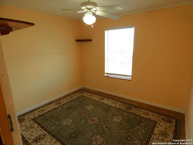 a view of a room with a window