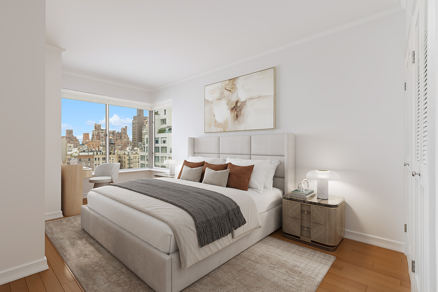 200 East 69th Street, Unit 16E Manhattan, NY 10021 - Photo 13 of 17 a bedroom with a large bed and a window