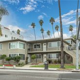 a front view of a building with street view
