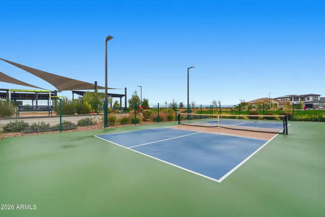 a view of swimming pool with a lake view