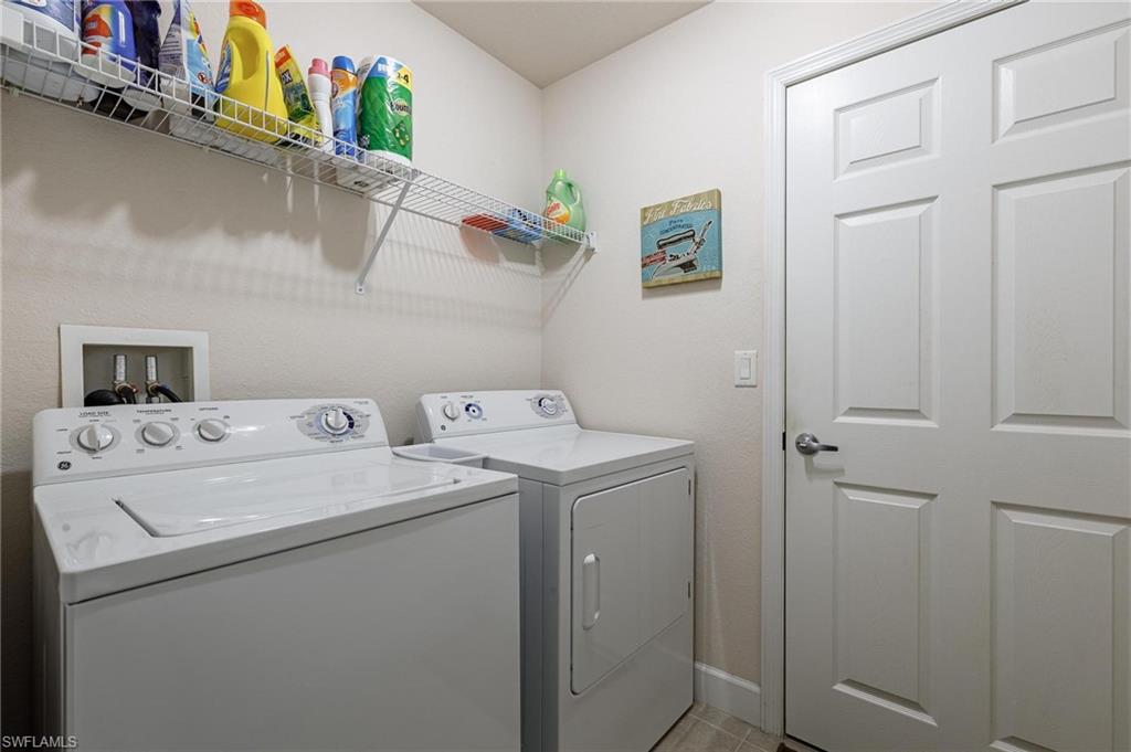 17298 Acapulco Road, Unit 512 Punta Gorda, FL 33955 - Photo 24 of 34 a utility room with dryer and washer