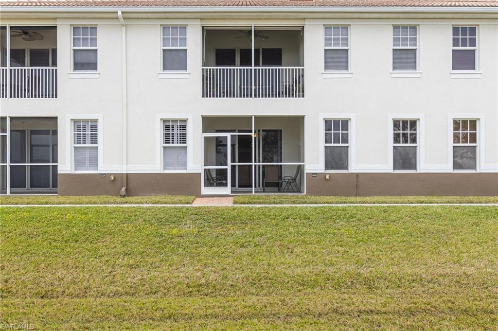 17298 Acapulco Road, Unit 512 Punta Gorda, FL 33955 - Photo 26 of 34 a house view with a garden space