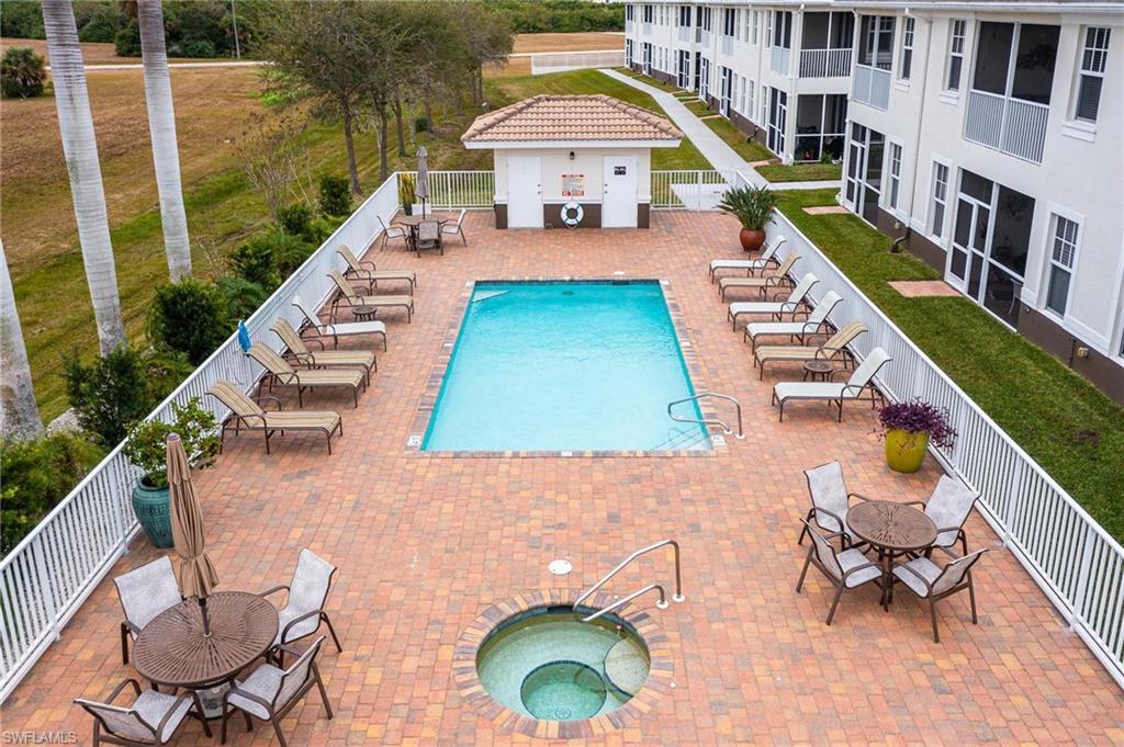 17298 Acapulco Road, Unit 512 Punta Gorda, FL 33955 - Photo 29 of 34 aerial view of a house with swimming pool outdoor seating