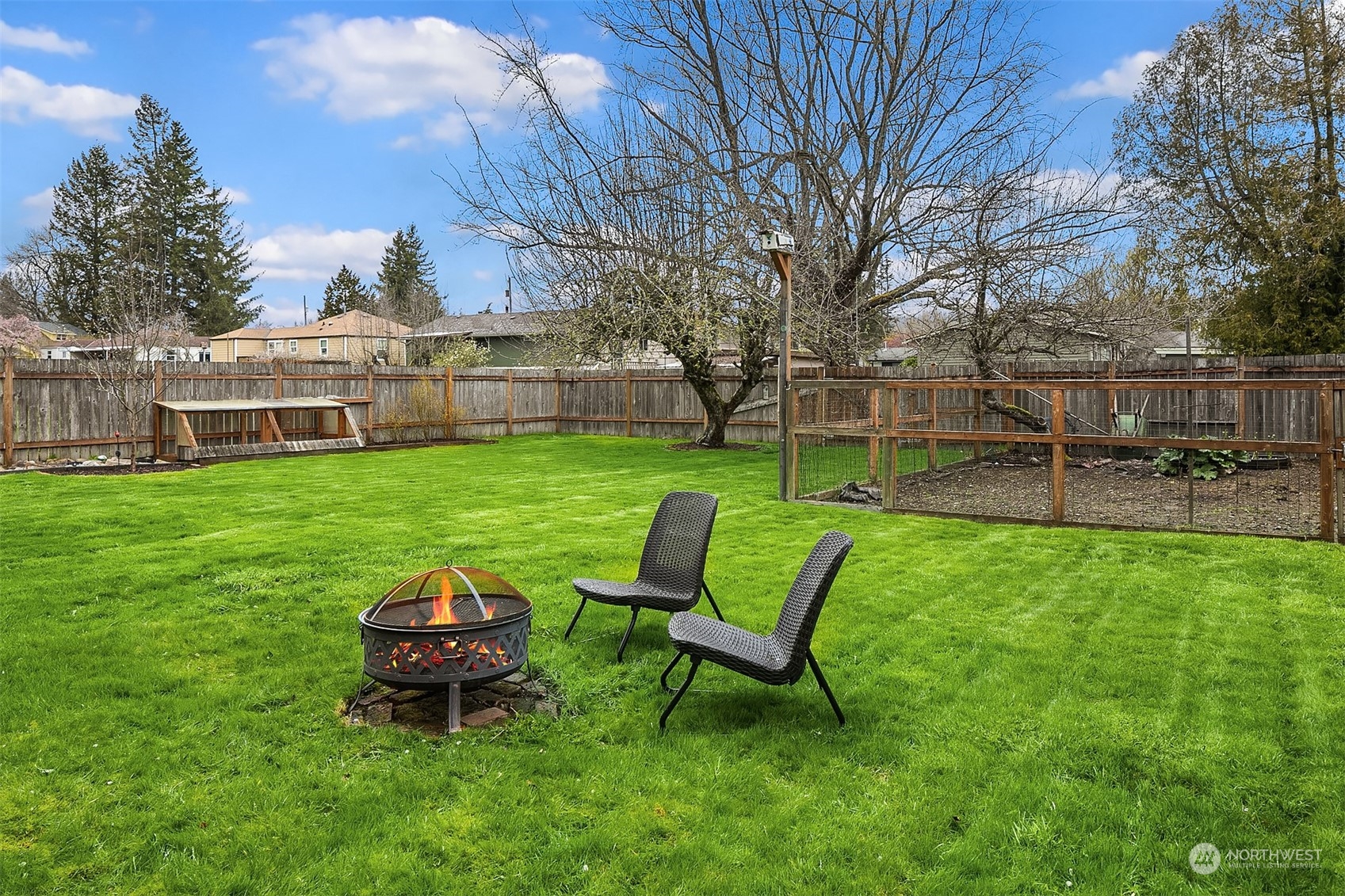 39152 Southeast Delta Street Snoqualmie, WA 98065 - Photo 22 of 26 a view of a house with a yard and sitting area