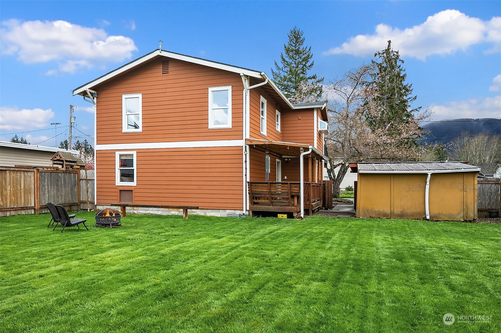 39152 Southeast Delta Street Snoqualmie, WA 98065 - Photo 24 of 26 a front view of house with yard and trees in the background