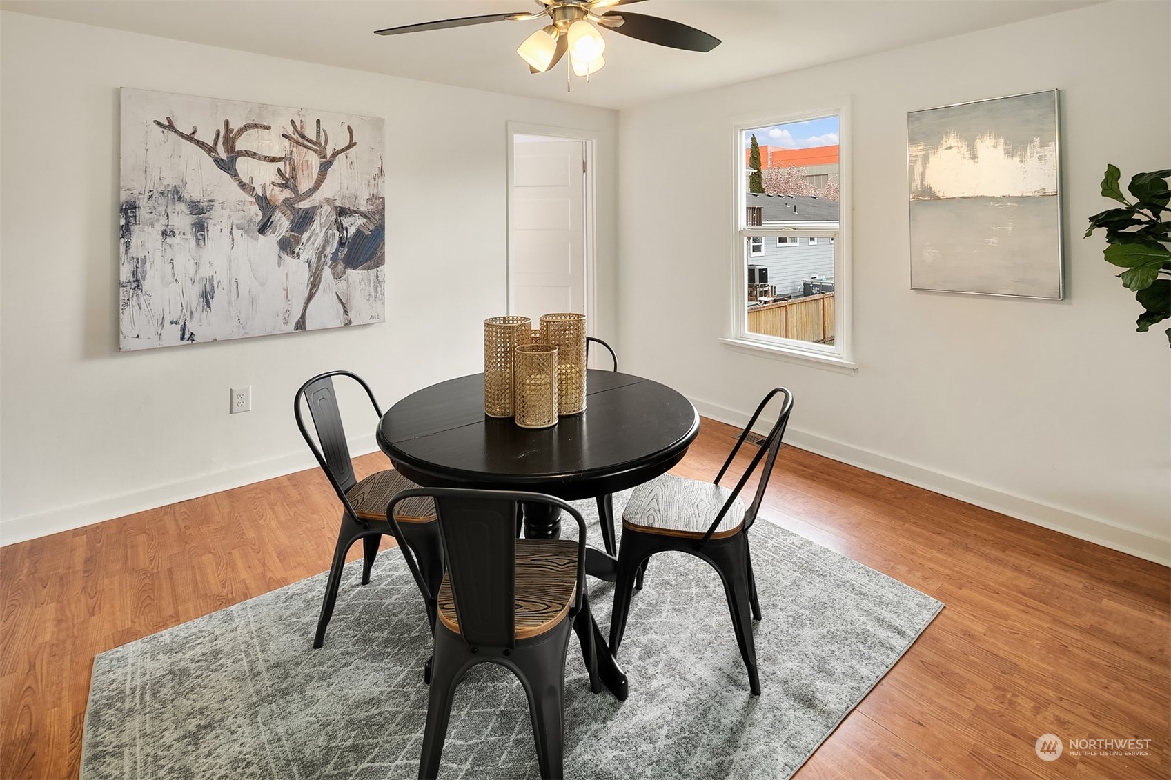 39152 Southeast Delta Street Snoqualmie, WA 98065 - Photo 5 of 26 a view of a dining room with furniture and wooden floor