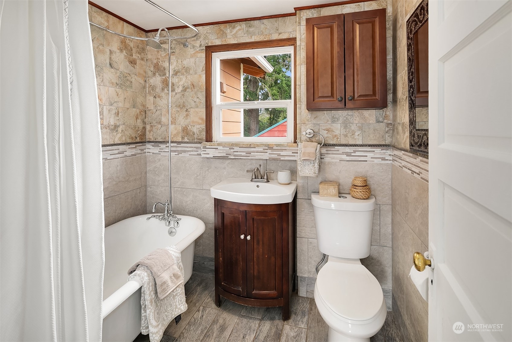 39152 Southeast Delta Street Snoqualmie, WA 98065 - Photo 9 of 26 a bathroom with a sink toilet and shower