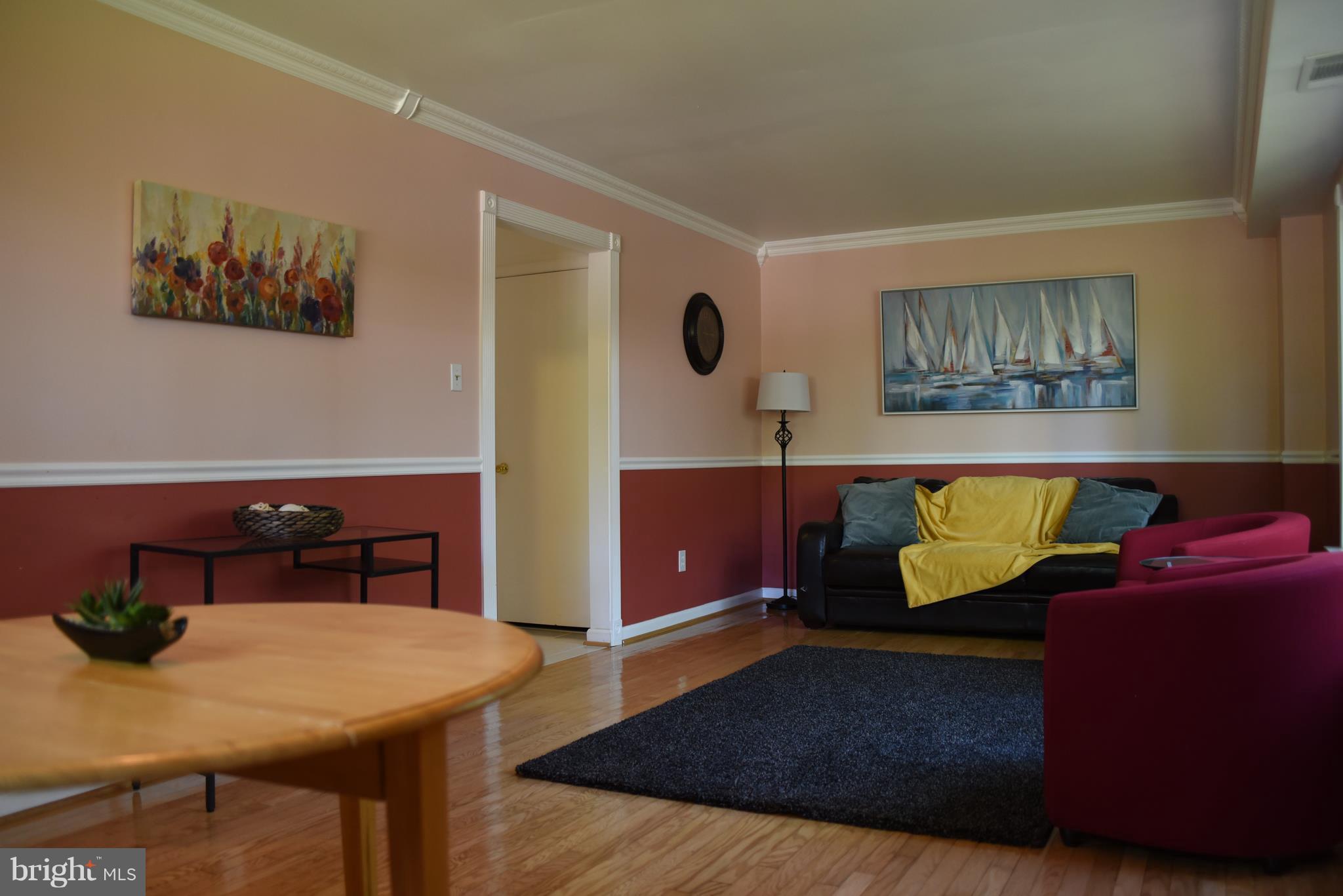8911 Victoria Road Springfield, VA 22151 - Photo 3 of 22 a living room with furniture