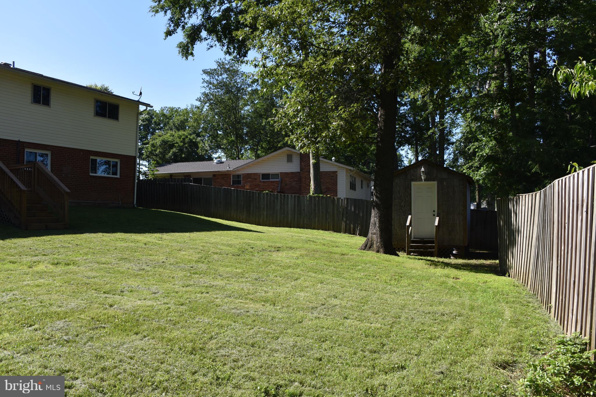 8911 Victoria Road Springfield, VA 22151 - Photo 21 of 22 a backyard of a house