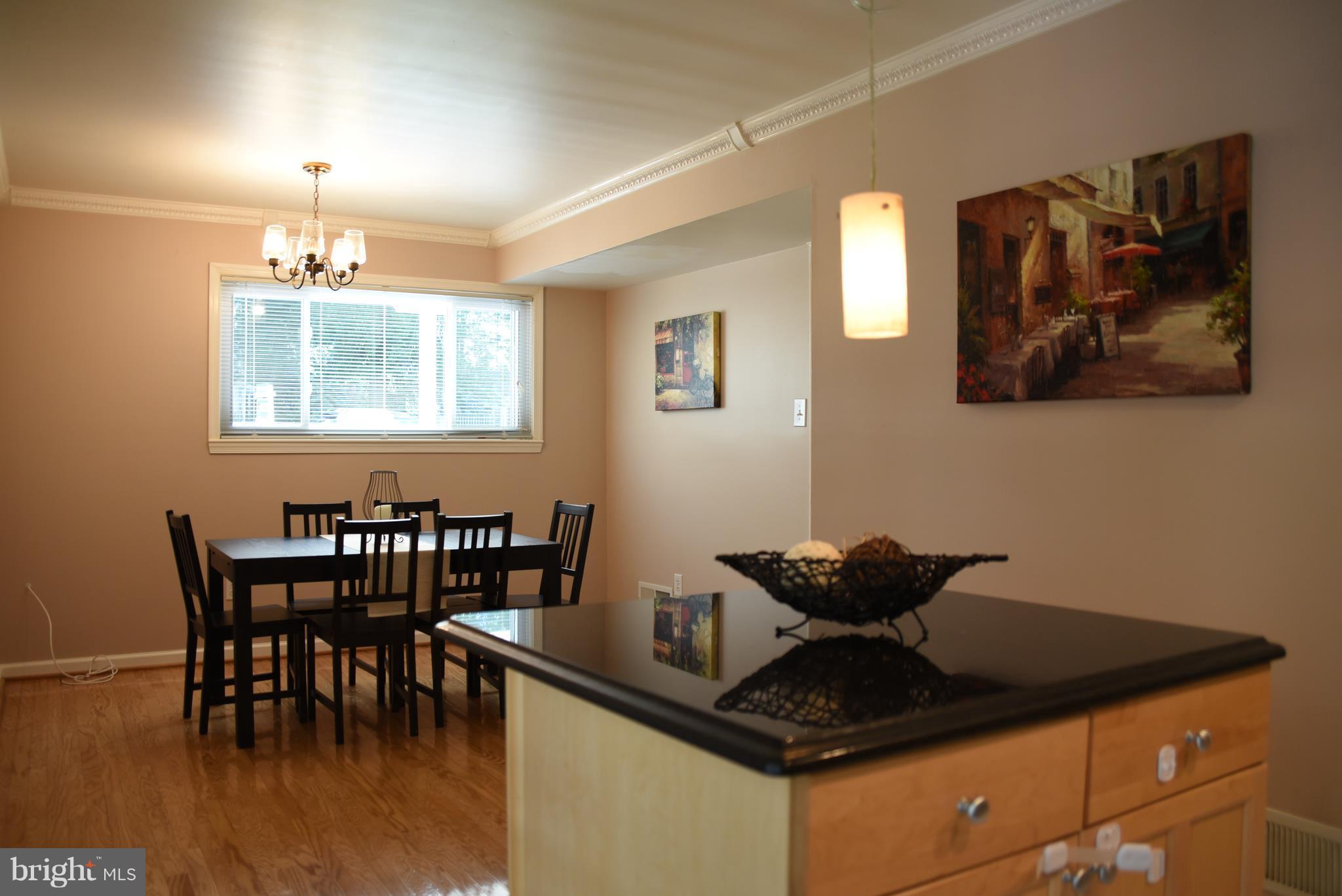 8911 Victoria Road Springfield, VA 22151 - Photo 22 of 22 a dining room with furniture and window