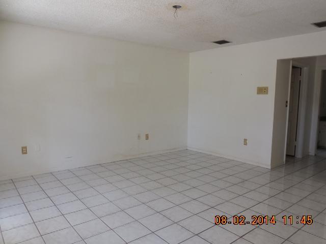 8240 Hidden Pines Road Fort Pierce, FL 34945 - Photo 6 of 14 Master Bedroom