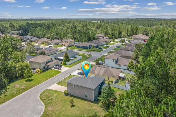 a view of a lake with a yard