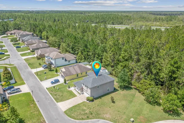 a sign that is on a brick wall