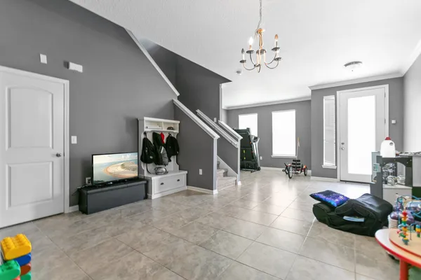 a kitchen with granite countertop a sink a counter top space appliances and cabinets