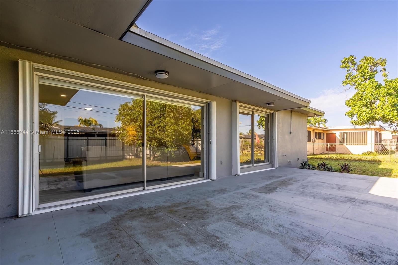 1465 Northwest 181st Street Miami Gardens, FL 33169 - Photo 12 of 15 a view of a house with a porch