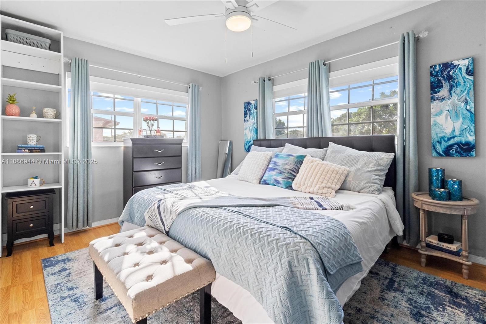 1465 Northwest 181st Street Miami Gardens, FL 33169 - Photo 8 of 15 a bedroom with a bed and a window