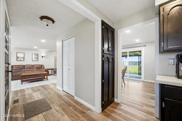 a bedroom with a bed and a tv