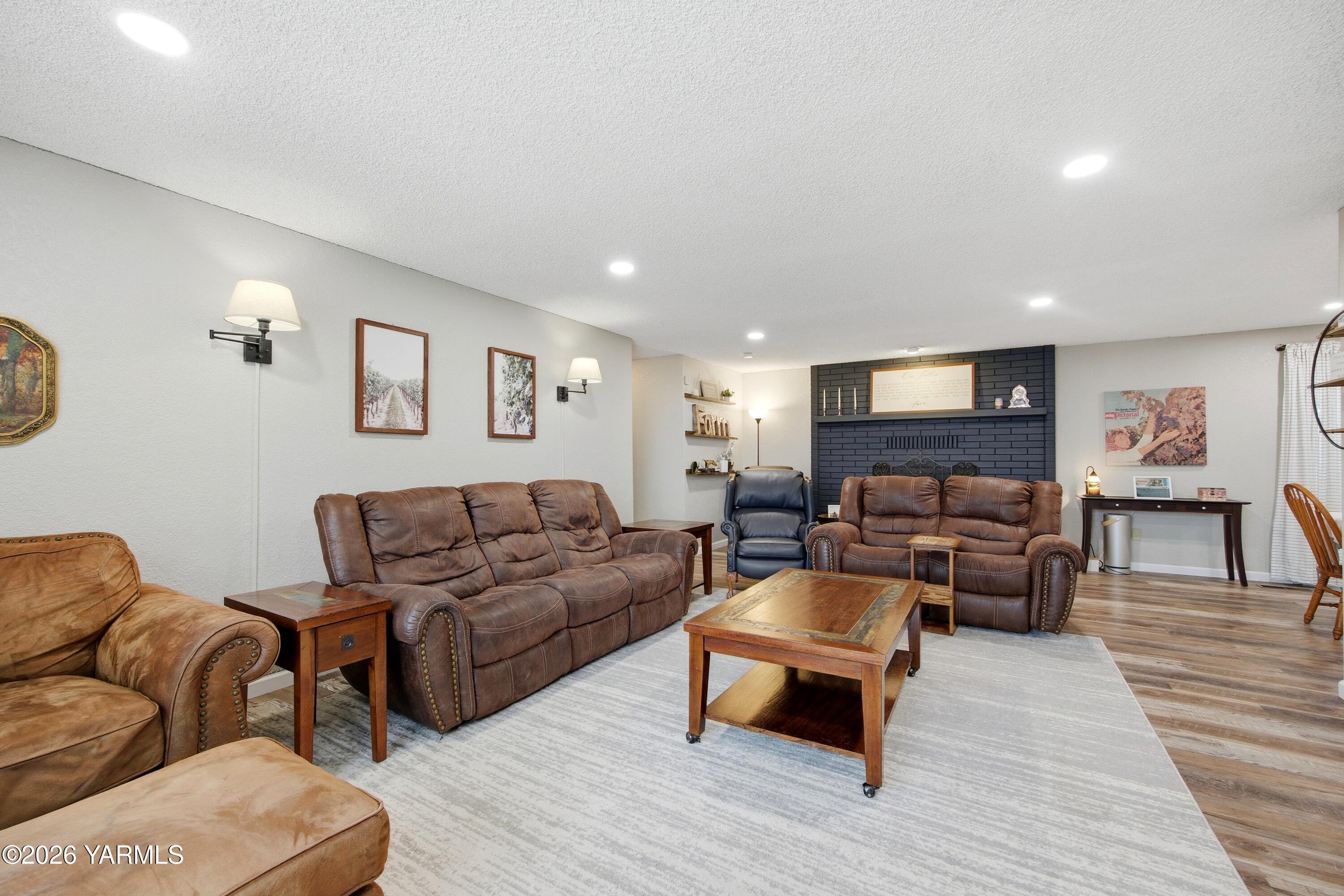 1681 Olmstead Road Grandview, WA 98930 - Photo 8 of 49 a living room with furniture and a couch