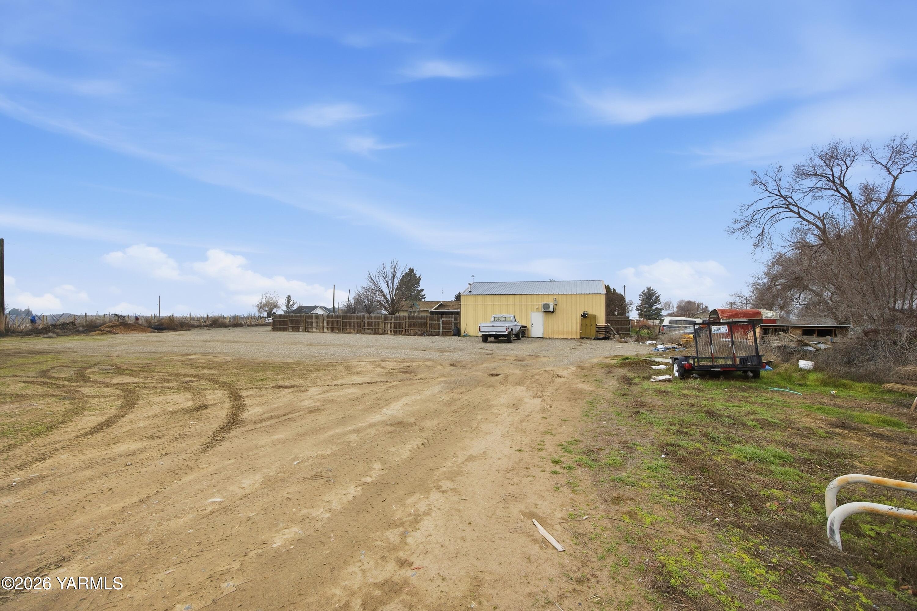 1681 Olmstead Road Grandview, WA 98930 - Photo 10 of 49 a view of a lake with houses