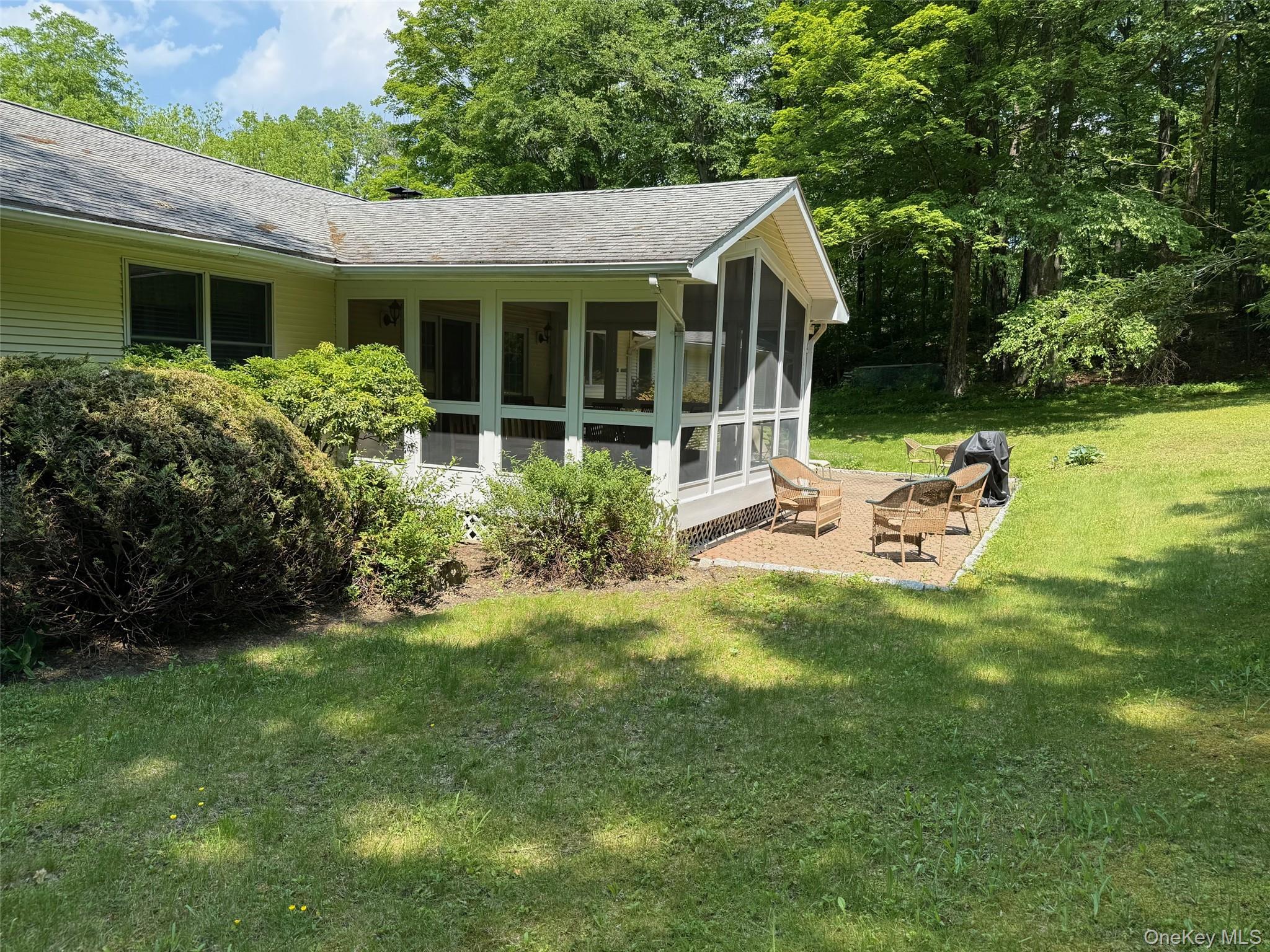 230 Cooper Road Millerton, NY 12546 - Photo 17 of 20 a front view of house with yard and green space