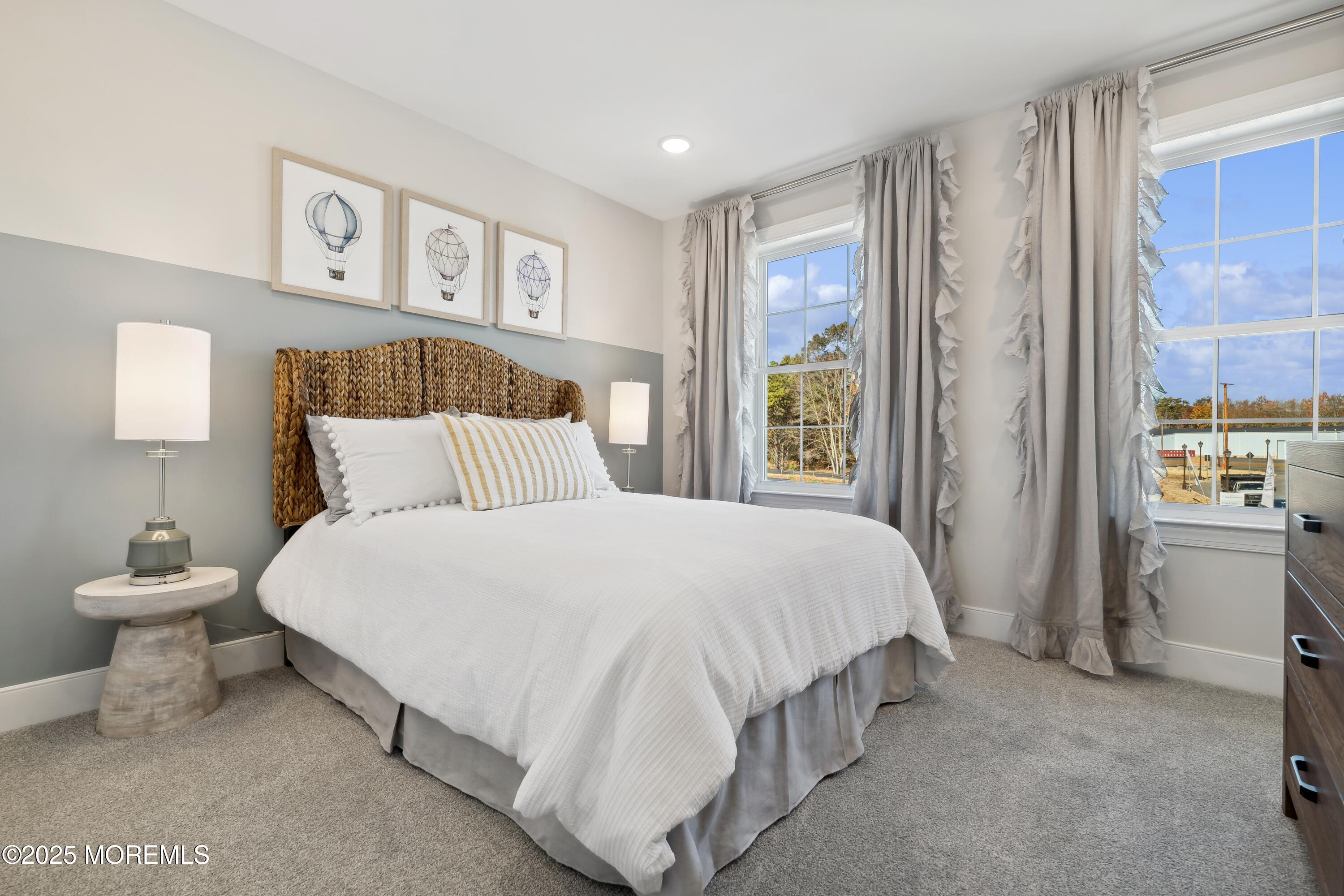 3043 Quail Ridge Boulevard Farmingdale, NJ 07727 - Photo 28 of 36 a bedroom with a bed and a table