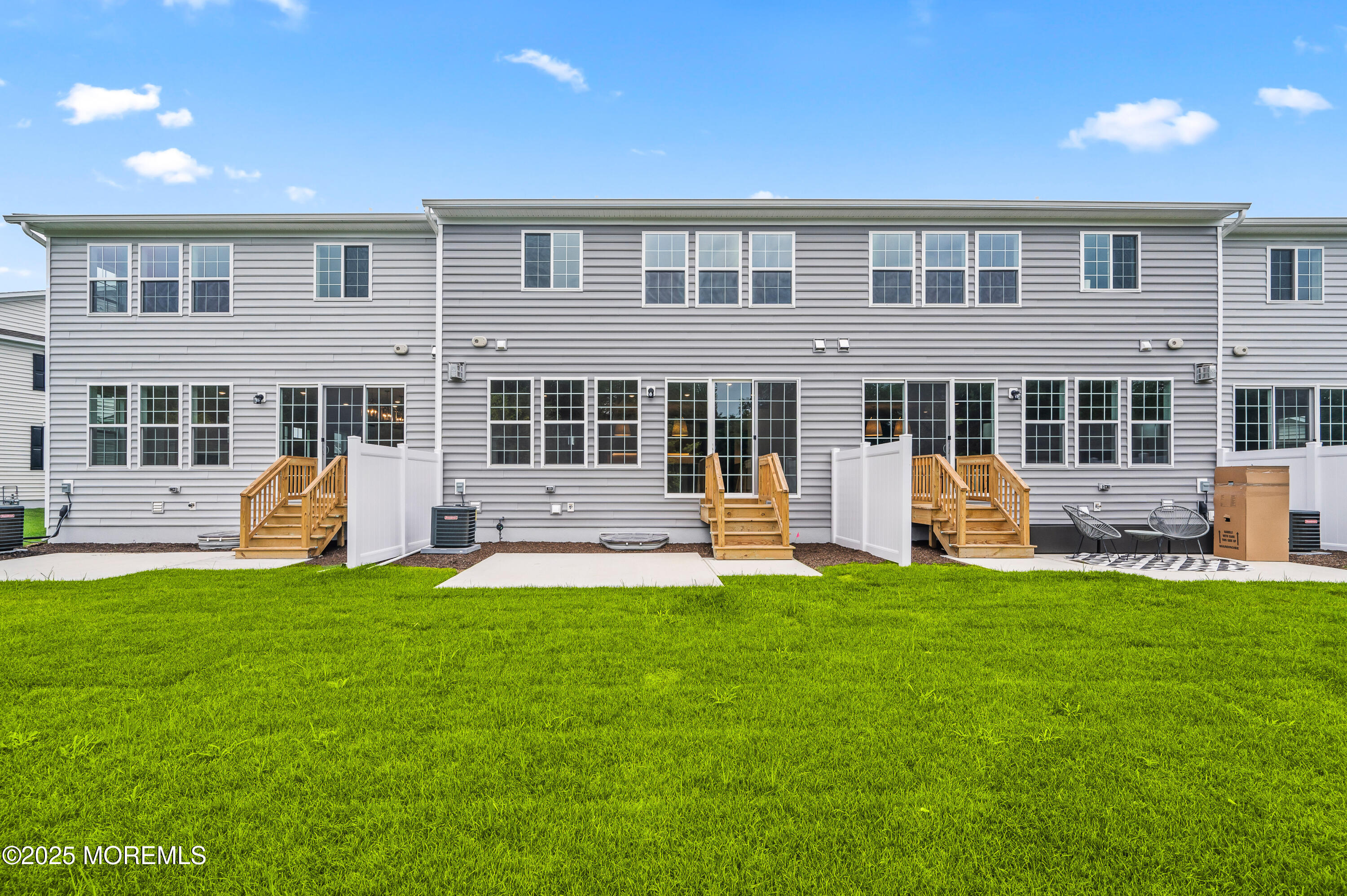 3043 Quail Ridge Boulevard Farmingdale, NJ 07727 - Photo 36 of 36 a view of a house with a yard and sitting area